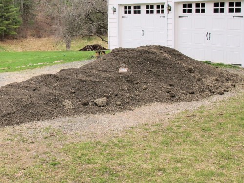 load of crushed stone in driveway