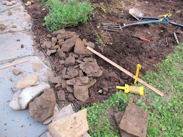 Rocks uncovered while planting a new garden bed.