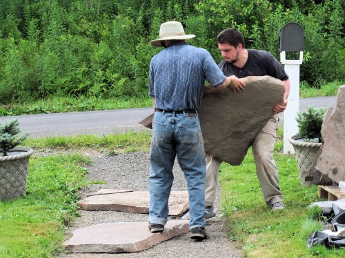 Make sure you have a way to move the stones into position when building a stone walk.