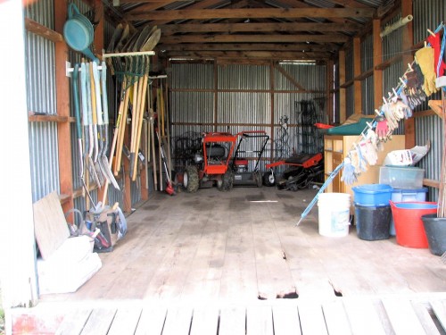 Organized shed before wheelbarrows wheeled in